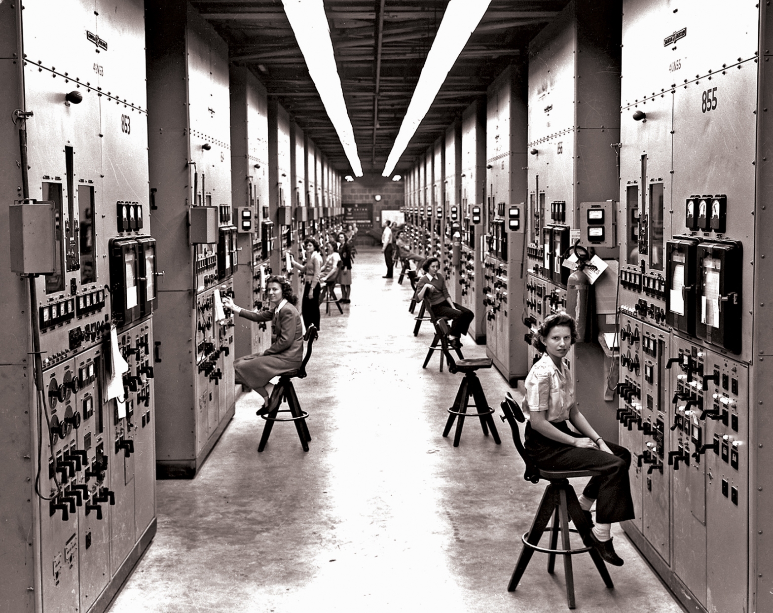 This photograph of the Calutron technicians is one of the most famous photographs from Oak Ridge and Gladys Owens is the technician closest to the camera.